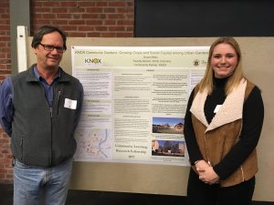 At the Research Fellows presentations, Grace Metry '18 stands in front of her poster with Ron Pitz of Knox, Inc., her community partner