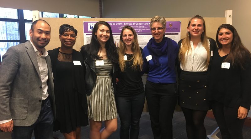 Spring 2018 Research Fellows presenters stand smiling with Professor Carol Clark at the end of their successful poster presentations!
