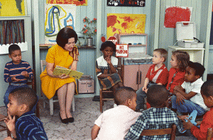 First Lady Lady Bird Johnson visiting a Head Start classroom in 1966, about a year after the program began
