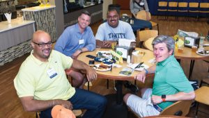 Russell Fugett ’01, Casey Tischer ’01, Miguel Marquez ’01, and Ben Sayles ’01 stop for breakfast before heading to Convocation.
