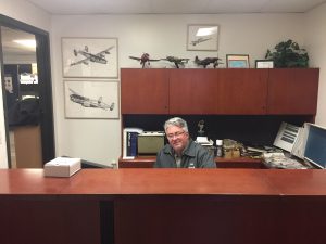 Front desk of Total Aircraft Parts and Maintenance with founder Francis Nelgion.