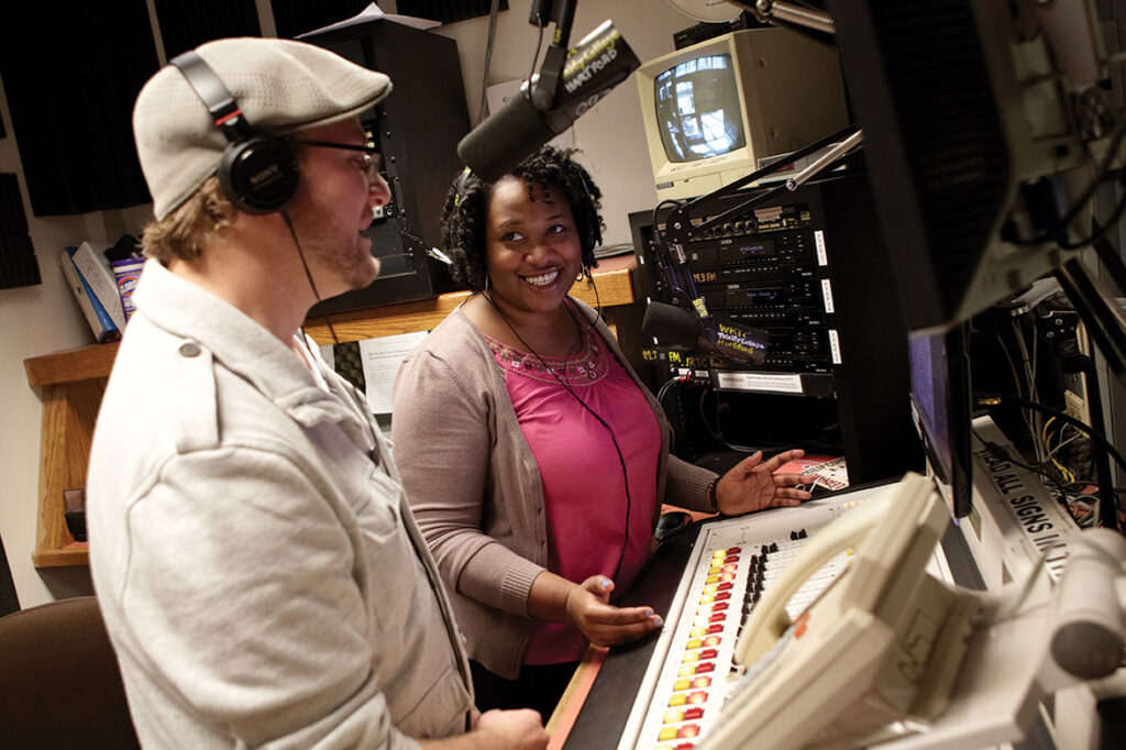 students on the air at the radio station